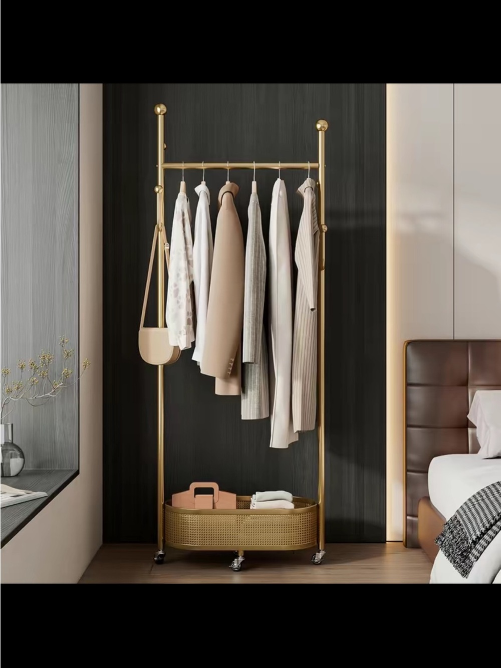 Elegant Gold Freestanding Clothing Rack with Bottom Storage Basket